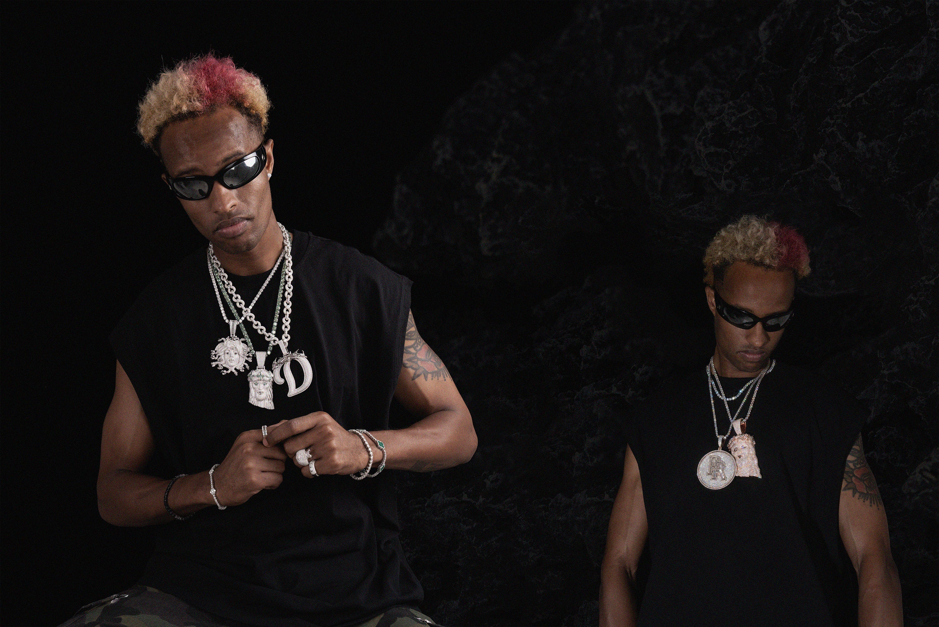 Luxury hip hop jewelry styling with custom pendants and diamond chains.
