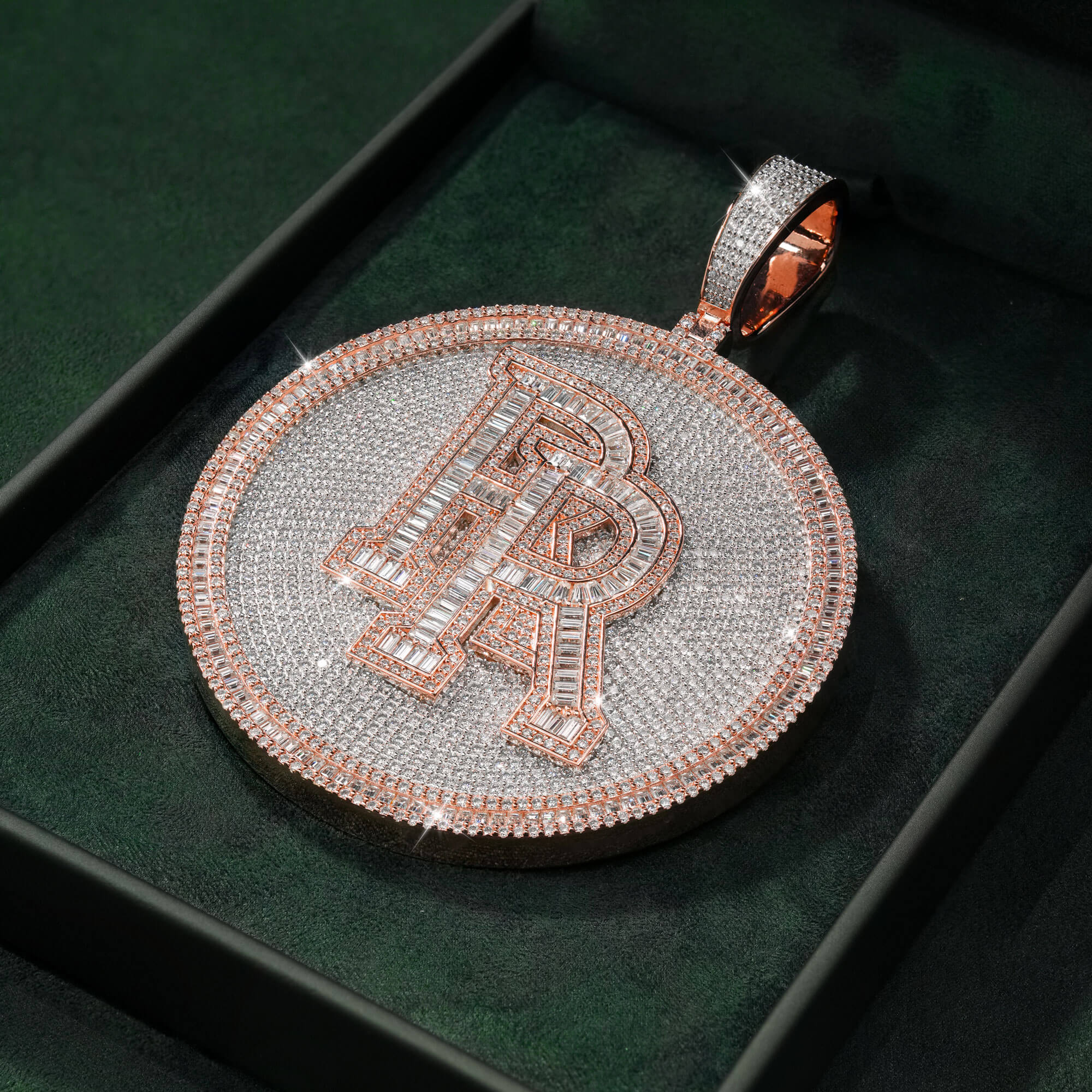 Luxury moissanite custom pendant featuring fully flooded VVS stones and custom R logo.