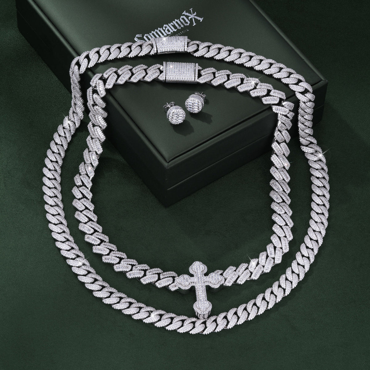 Sommarnox Cross Layer Set — flat lay of copper and CZ jewelry