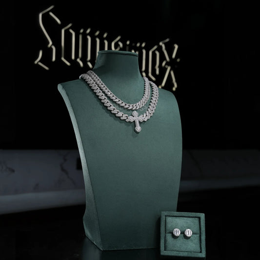 Sommarnox Iced Out Cuban and Cross 2-Chain Set with a free pair of earrings on a green jewelry bust